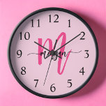 Hot Pink Modern Script Girly Monogram Name  Clock<br><div class="desc">Make a bold statement in your space with our Hot Pink Modern Script Girly Monogram Name Large Clock! Featuring a vibrant hot pink design and personalised with your name in an elegant modern script, this clock adds a stylish and personal touch to any room. Perfect for bedrooms, offices, or living...</div>