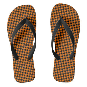 houndstooth pattern black and orange flip flops
