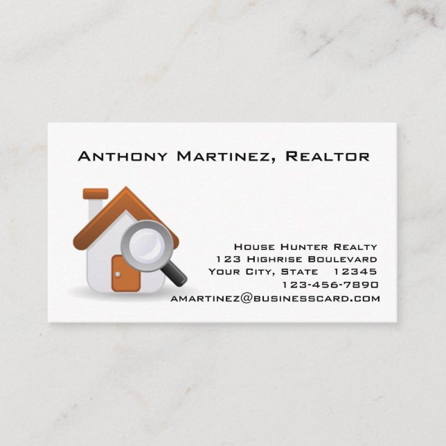 House and Magniyfing Glass Business Card (Front)