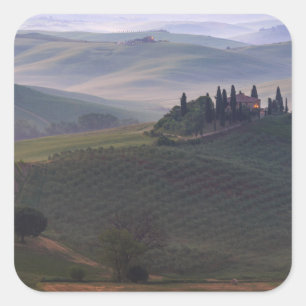 House in Tuscany in the morning fog sticker