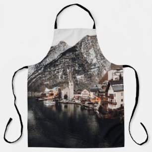 HOUSES NEAR BODY OF WATER AND MOUNTAIN APRON