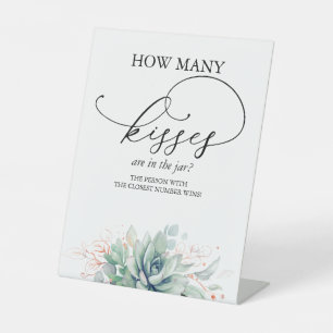 How many kisses are in the jar? pedestal sign