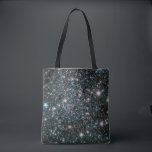 Hubble Heavy Metal Stars Cluster Tote Bag<br><div class="desc">A stunning view of the globular cluster NCG 6496 captured by the NASA Hubble space telescope and showing many “heavy metal” stars,  those with elements heavier than hydrogen and helium in their composition. Some pulsate by varying their brightness over time.</div>
