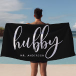 Hubby Black And White Newlywed Groom Beach Towel<br><div class="desc">Show off your newlywed status with this sleek "Hubby" beach towel in black and white, perfect for honeymoons, beach days, or poolside relaxation. Designed for grooms and husbands, this towel can be personalised with a last name, making it a thoughtful gift or stylish accessory. Whether for the beach or pool,...</div>