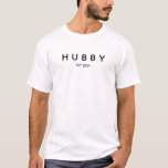 HUBBY Est.  T-Shirt<br><div class="desc">Celebrate the momentous journey into marriage with our HUBBY Est. T-Shirt, a playful yet significant way to commemorate the start of marital bliss. This T-shirt, with its bold declaration, is designed for the new husband eager to showcase his status. The design is striking in its simplicity: "HUBBY" in large, confident...</div>