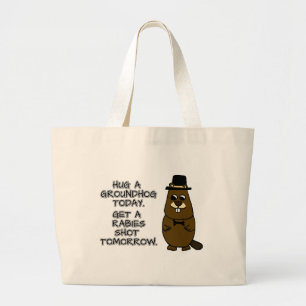 Hug a groundhog today. Get a rabies shot tomorrow. Large Tote Bag