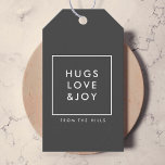 Hugs Love and Joy Stylish Christmas Charcoal Grey Gift Tags<br><div class="desc">Simple, stylish, trendy holiday gift tags with modern minimal typography quote "Hugs Love & Joy" in white with a clean simple white border. The name and greeting can be easily customised for a personal touch. A bold, minimalist and contemporary christmas design with charcoal grey feature colour to stand out from...</div>