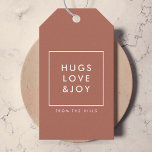 Hugs Love and Joy | Terracotta Burnt Orange Modern Gift Tags<br><div class="desc">Simple, stylish, trendy holiday gift tags with modern minimal typography quote "Hugs Love & Joy" in white with a clean simple white border. The name and greeting can be easily customised for a personal touch. A bold, minimalist and contemporary christmas design with a terracotta burnt orange rust feature colour to...</div>