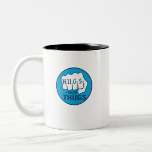 HUGS NOT THUGS Two-Tone COFFEE MUG