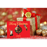 Hummingbird Christmas Card<br><div class="desc">Hummingbird Christmas Card featuring Ruby-Throated Hummingbirds. Created with photo taken by Audrey Wenzler of Audrey's Creations and AI created Ornament. If you love hummingbirds I am sure you will love this Christmas Card. It is one of a kind.</div>