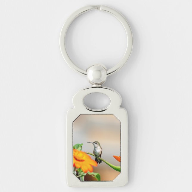 Hummingbird on a flowering plant key ring (Front)