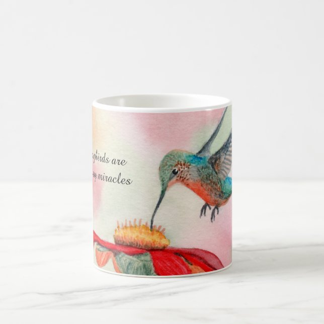 Hummingbird watercolor art on a coffee mug (Center)