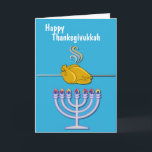 Humourous Thanksgivukkah Custom Holiday Card<br><div class="desc">Fun custom Thanksgivukkah greeting card done in a sky blue,  with graphics of a spit roasting turkey over a Menorah.  White text,  on the front reads,  Happy Thanksgivukkah.  Personalise the text inside to read what you want.</div>
