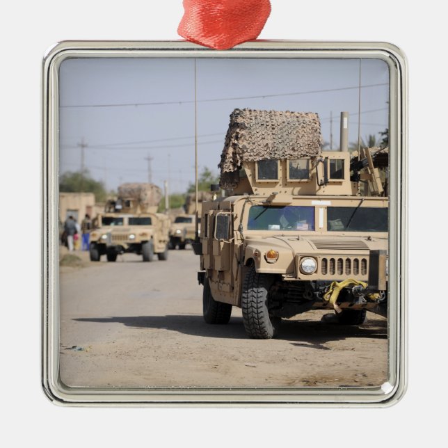 Humvee's conduct security during a patrol metal tree decoration (Front)
