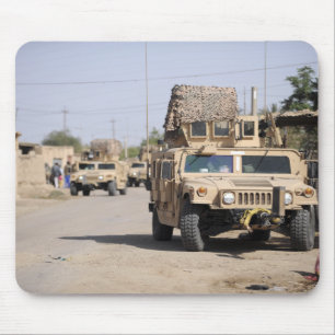 Humvee's conduct security during a patrol mouse mat