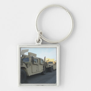 Humvees sit on the pier at Morehead City Key Ring
