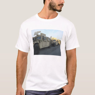 Humvees sit on the pier at Morehead City T-Shirt