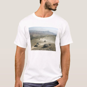 Humvees traverse rugged mountain roads T-Shirt