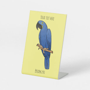 Hyacinth macaw bird cartoon illustration pedestal sign