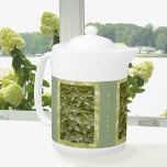 Hydrangea Celadon Green Floral<br><div class="desc">This garden fresh green teapot features 3 panels of tiny delicate blossoms of a pale celadon green hydrangea flower. It is a unique colour that is fresh and light with the feel of a charming country cottage garden. It is a summery floral in subtle soft tonal shades and details. It...</div>