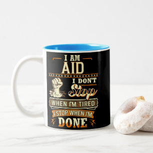I Am Aid. I Don't Stop When I'm Tired Two-Tone Coffee Mug