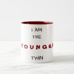 I AM THE ***YOUNGER*** TWIN "MUG" Two-Tone COFFEE MUG<br><div class="desc">THIS MUG HAS A MATCHING ***T-SHIRT*** AND OF COURSE ***BIRTHDAY CARD*** AND IF YOU USE THE TAGS, "YOUNGER TWIN", "TWIN'S BIRTHDAY" OR "OLDER TWIN" FOR THE TEE YOU WILL FIND THEM IN THIS STORE! AND, HAPPY BIRTHDAY TO YOU BOTH AND THANKS FOR STOPPING BY AllAboutTwins one of my "9" stores!!!!!...</div>