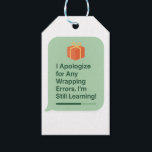 I Apologise for Any Wrapping Errors – Funny AI Gif Gift Tags<br><div class="desc">Add a dose of AI-powered humour to your holiday or birthday gifts with this playful tag design that reads: “I Apologise for Any Wrapping Errors. I'm Still Learning!” Perfect for tech lovers, AI fans, and anyone who appreciates a clever laugh under the tree. Printed in high-quality, 300 DPI on durable...</div>