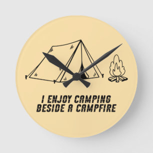 I enjoy camping beside a campfire round clock