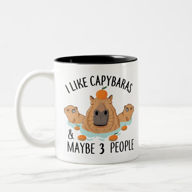I like Capybaras and maybe 3 people Funny Baby Two-Tone Coffee Mug (Left)