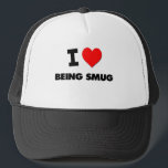 I love Being Smug Trucker Hat<br><div class="desc">Use the search tool at my store to find other Being Smug merchandise. I love Being Smug products avaiable on tshirts, sweatshirts, kids shirts, infant onsies, stickers, magnets, and much more Being Smug clothing fully customisable to your specifcations. If you like what you see, please link to my store (www.zazzle.com/ilovemyshirt)...</div>
