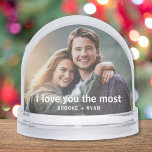 I Love You The Most Romantic Couple Photo Custom Snowglobe<br><div class="desc">I Love You The Most Romantic Couple Modern Photo Template Custom Snow Globes features your favourite photo with your personalised names with the customisable text "I love you" in modern calligraphy script. Makes a fantastic gift for Christmas, holidays, birthday, anniversary, Valentine's Day and more. Personalise by editing the text in...</div>