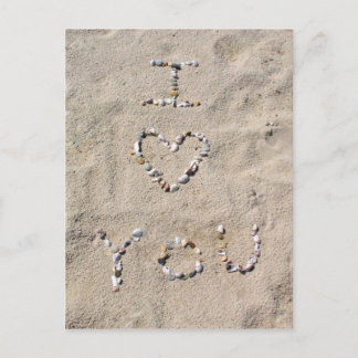 I LOVE YOU written in sea shells in the sand Postcard
