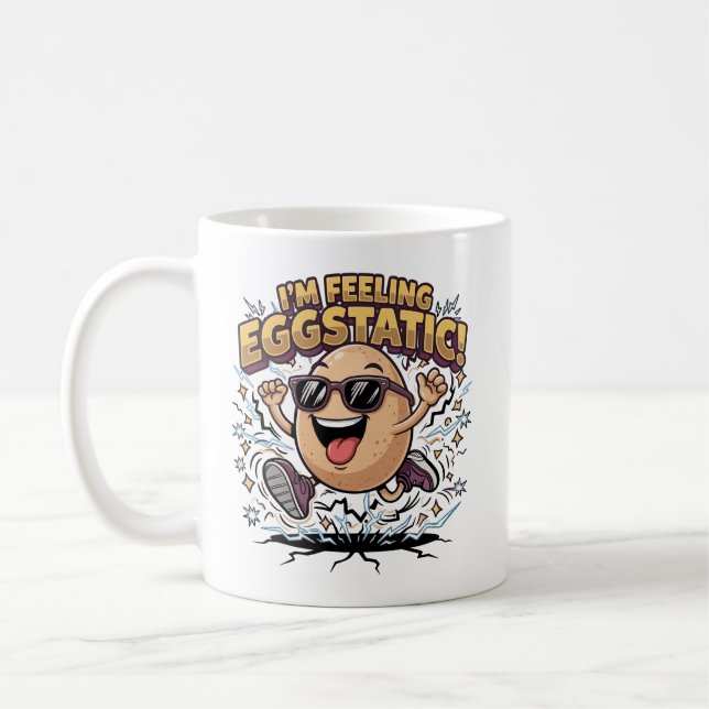 I’m Feeling Eggstatic – Funny Egg Pun Cartoon Coffee Mug (Left)