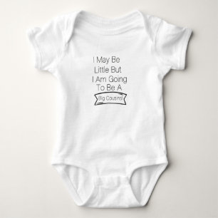 I May Be Little But I Am Going To Be A Big Cousin Baby Bodysuit