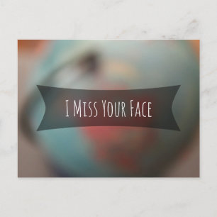 "I Miss Your Face" Over Photo of Blurred Globe Postcard