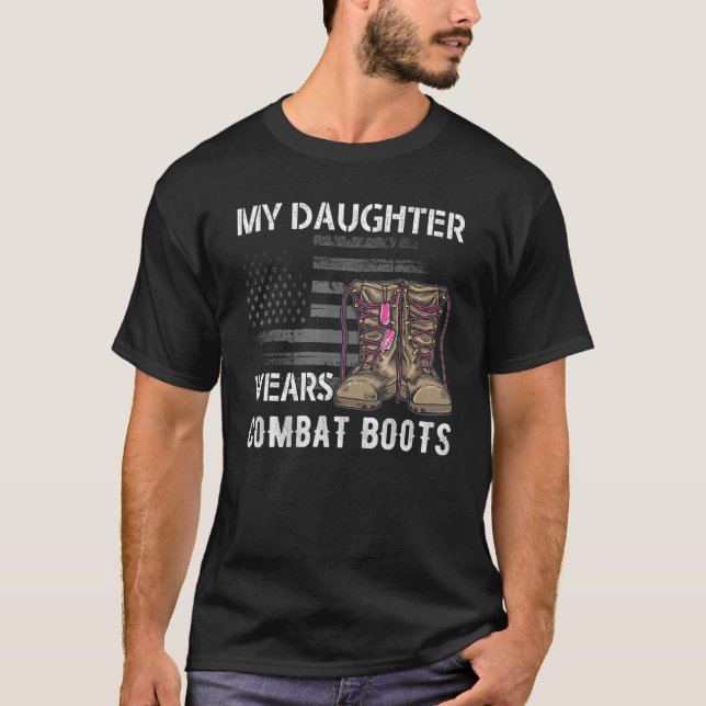 I proudly support our Troops my doughter wears com T-Shirt (Front)