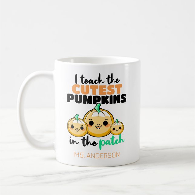 I Teach The Cutest Pumpkins Halloween Teacher Coffee Mug (Left)