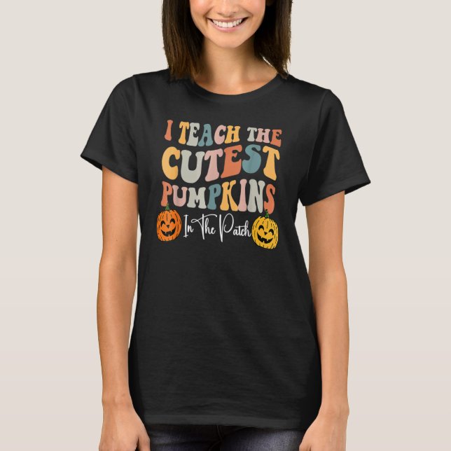 I Teach The Cutest Pumpkins In The Patch Groovy Te T-Shirt (Front)
