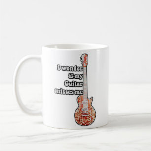 I wonder if my guitar misses me. funny quote coffee mug