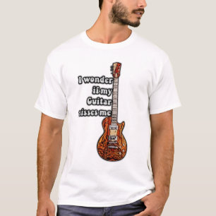 I wonder if my guitar misses me. vintage colors T-Shirt