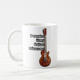 I wonder if my guitar misses me. vintage colours coffee mug