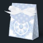 Ice blue snowflake favour box<br><div class="desc">In winter,  these ice-blue snowflakes fall on my imaginary world. They have 7 branches,  soft blue tones and rhinestones embedded inside. For anyone who loves blue pastels and snowy holidays.</div>