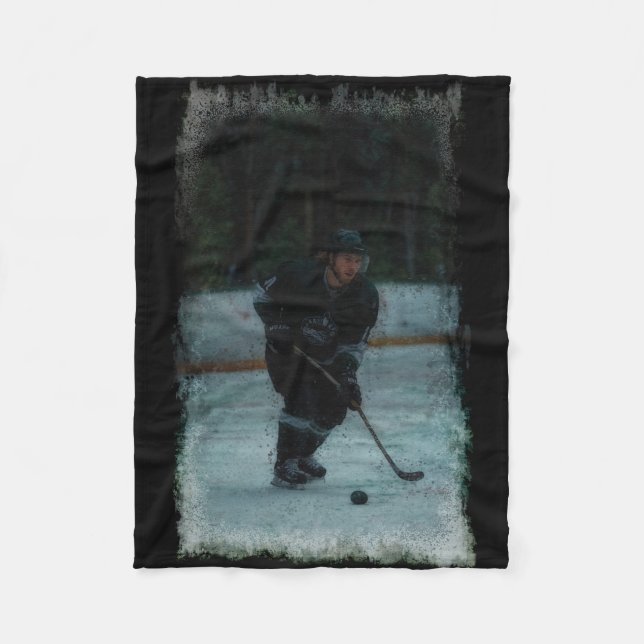 Ice Hockey Player Warming Up Fleece Blanket (Front)