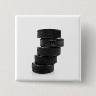 Ice hockey pucks... button