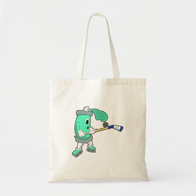 Ice spray at Ice hockey with Ice hockey stick Tote Bag (Front)
