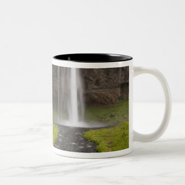 Iceland. People on trail behind Seljalandsfoss Two-Tone Coffee Mug (Right)