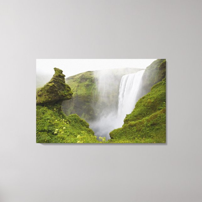 Iceland. Skogarfoss Waterfall plunges over a Canvas Print (Front)