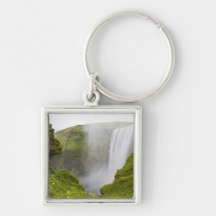 Iceland. Skogarfoss Waterfall plunges over a Key Ring