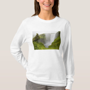 Iceland. Skogarfoss Waterfall plunges over a T-Shirt
