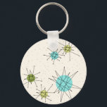 Iconic Atomic Starbursts Button Keychain<br><div class="desc">This Iconic Atomic Starbursts Button Keychain pattern features iconic atomic starbursts. That’s right! The old school, cream coloured background with gold speckles is the perfect backdrop for the vibrant turquoise, soothing celery, and kitschy pear green coloured circles. The spots of colour are sporadically placed in various sizes with overlaying black...</div>